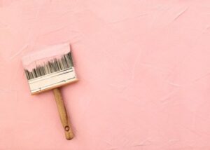 Homeowner evaluating qualifications and work samples to select reliable interior painters in Edmonton