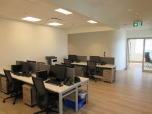 Freshly painted modern office interior with bright, clean walls enhancing productivity and workplace atmosphere