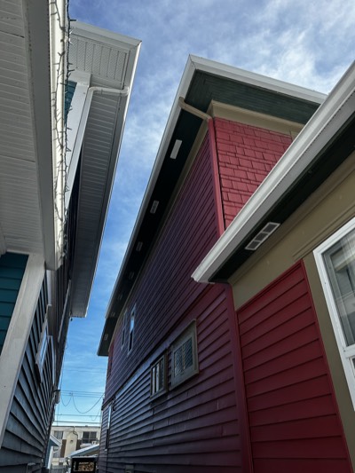 Row of colorful painted houses showcasing vibrant exterior colour choices