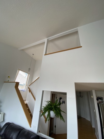 White painted vaulted ceiling loft space with bright airy atmosphere