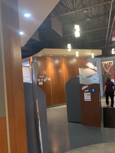 Commercial office with wood panel accent and freshly painted surrounding walls