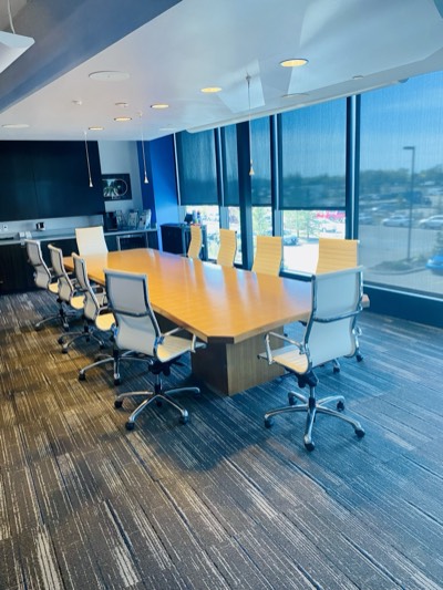 Freshly painted corporate boardroom with professional finish and modern furnishings
