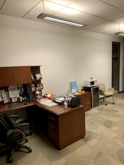 Corporate office with bright white painted walls and clean professional look