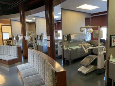 Dental office accent wall in burgundy with professional painted finish