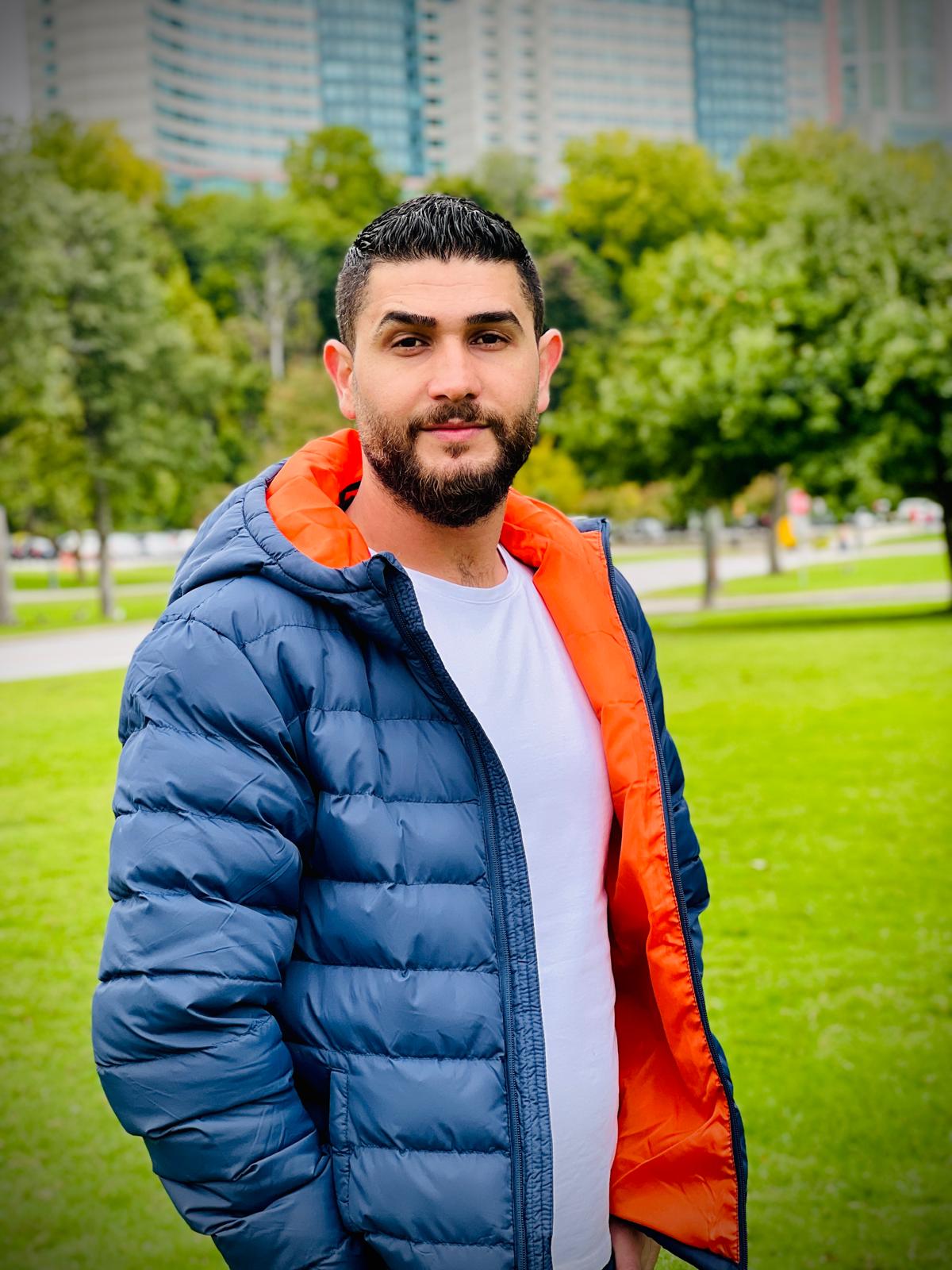 Hany, spray finish specialist at iPaint Painting, Edmonton Alberta