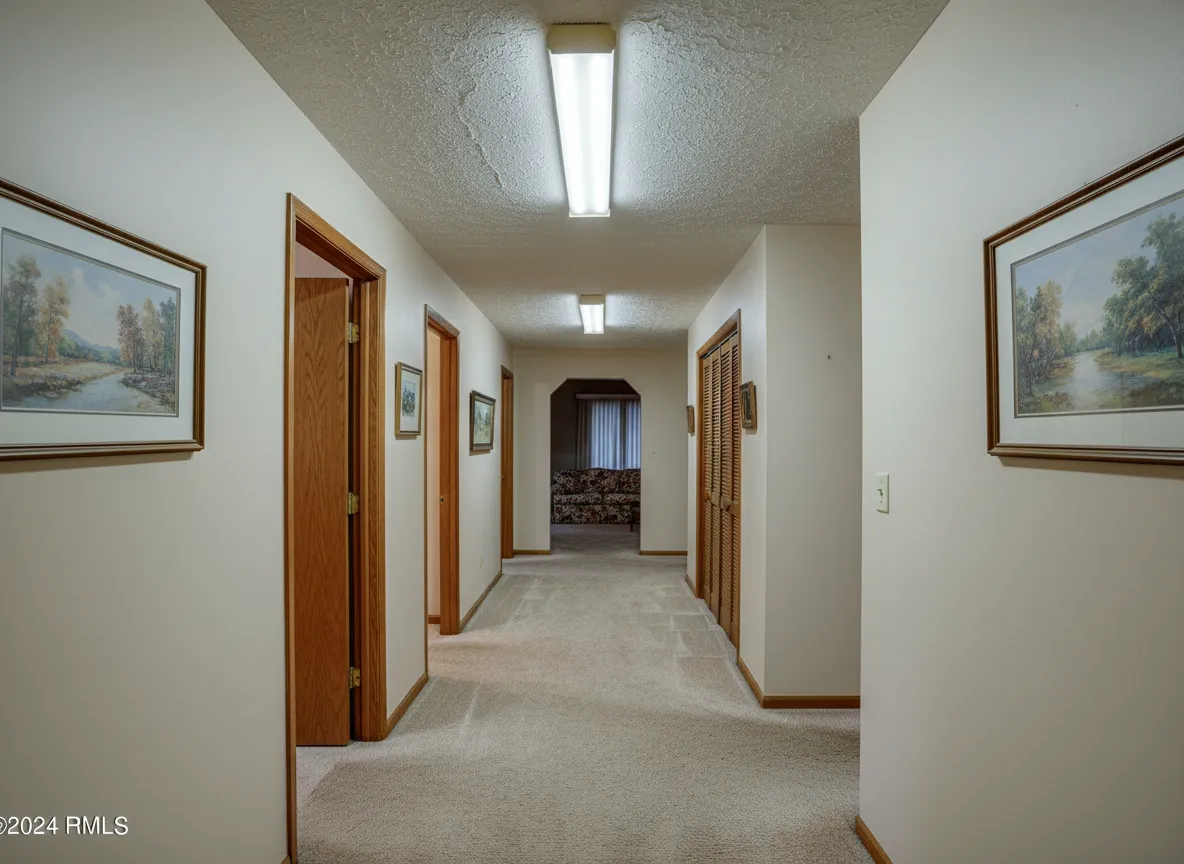 Hallway with popcorn ceiling before removal