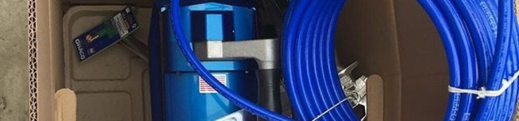 Advanced paint spraying equipment used by professional painters for efficient and high-quality application