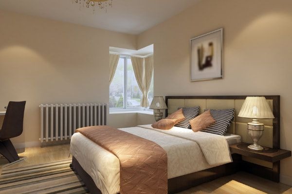 Guest room interior featuring soft neutral paint colours designed to create a welcoming and comfortable atmosphere