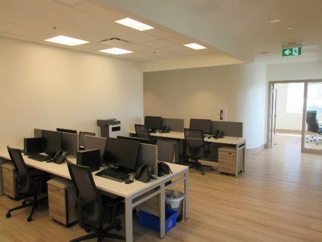 Freshly painted modern office interior with bright, clean walls enhancing productivity and workplace atmosphere